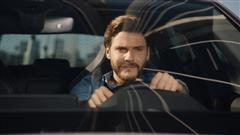 The Sweet Smile Of Daniel Brühl In The Cupra Leon e-HYBRID, He Joined the Tribe